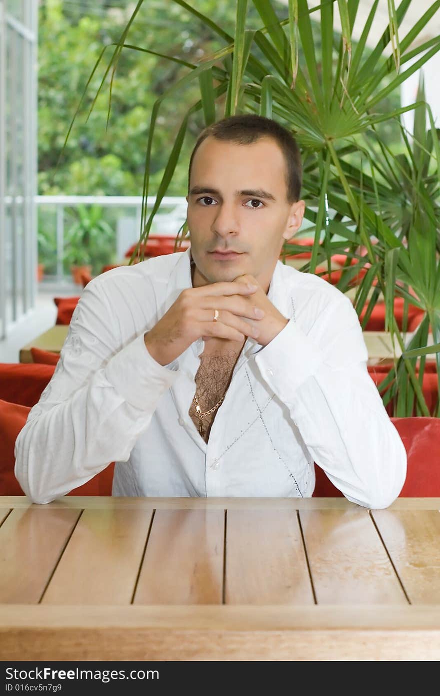 Young man in cafe