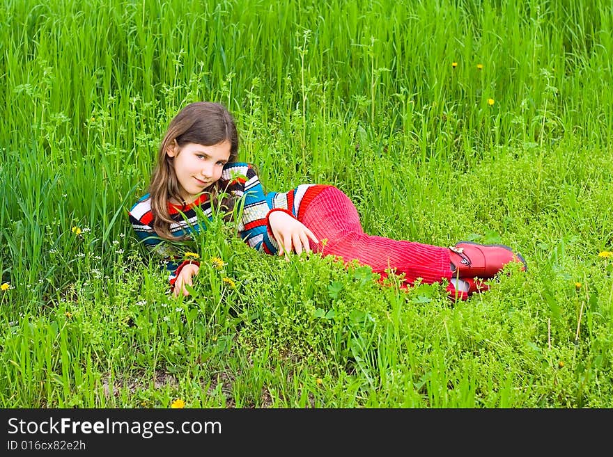 Teen girl in grass for your design