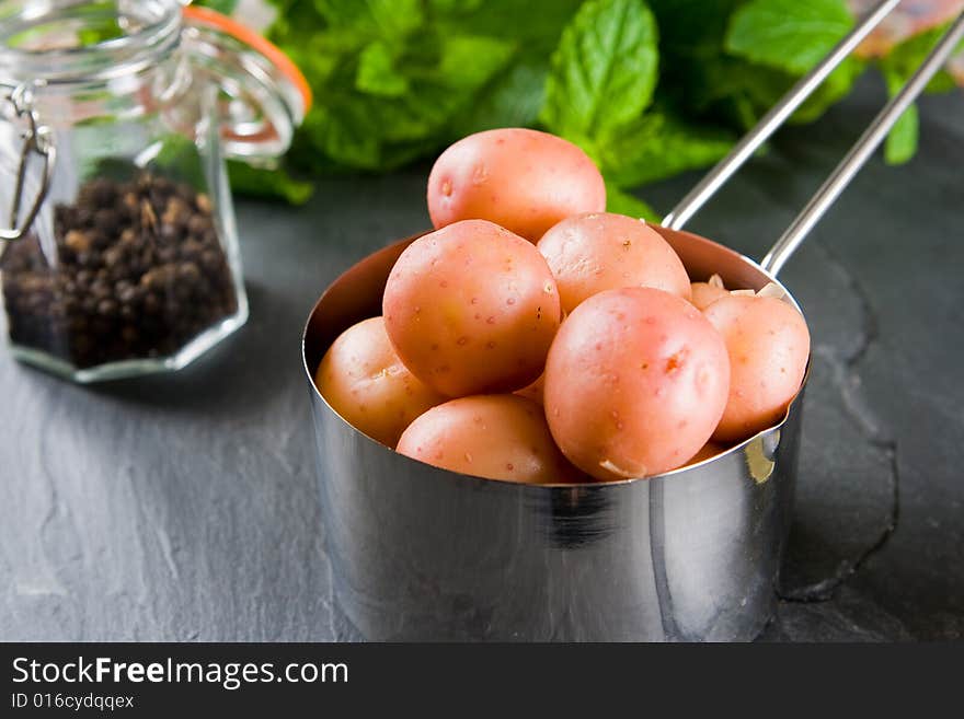 New Potatoes In A Small Pan With Pepper