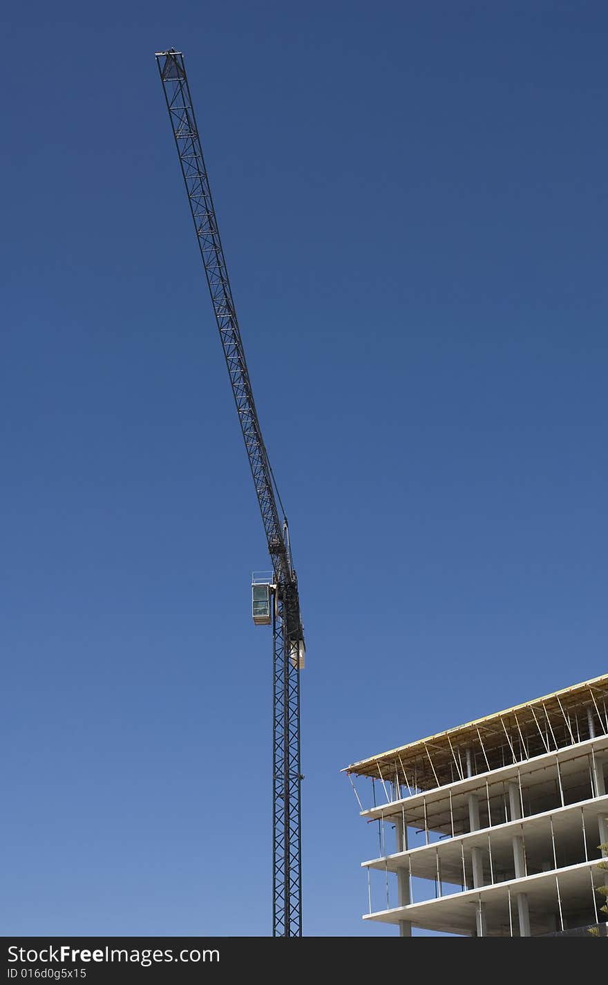 Under construction. Building under construction, with crane