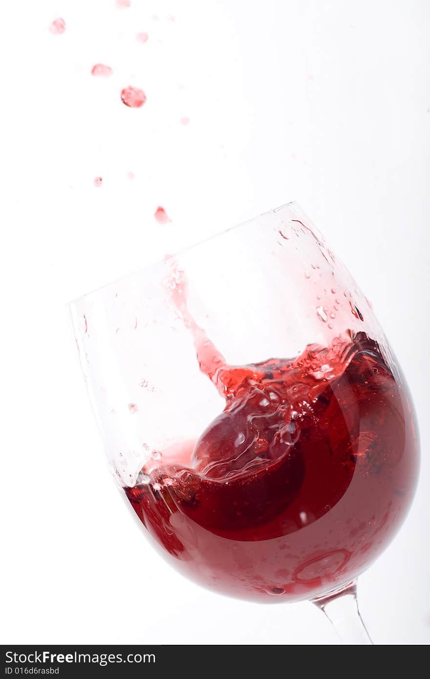 Red wine splash on white background. Red wine splash on white background.