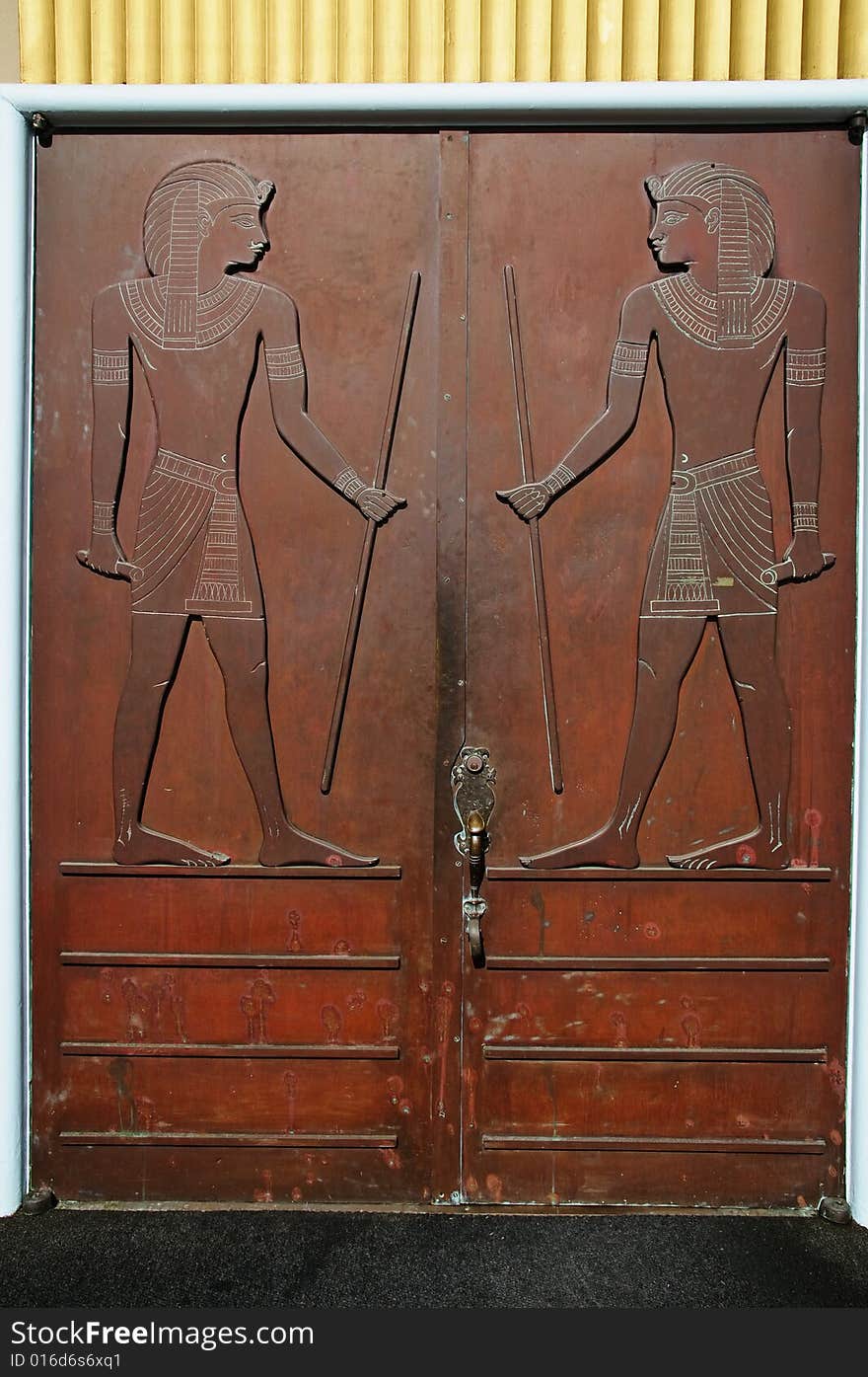 Crafty woden door with replica of ancient egyptian relief