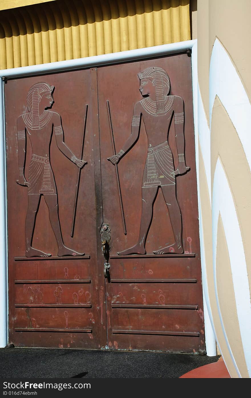 Crafty wooden door with replica of ancient egyptian relief