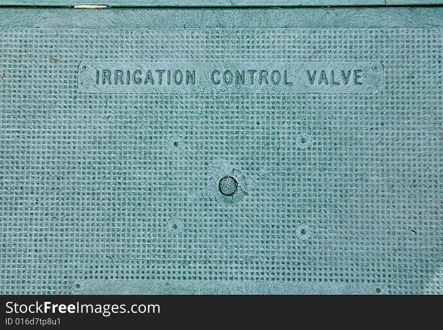 Grunge metal irrigation control valve hatchway