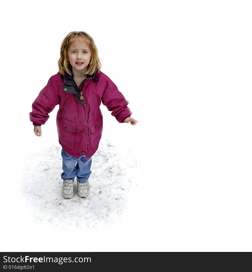 One little girl playing in the snow on a winter day