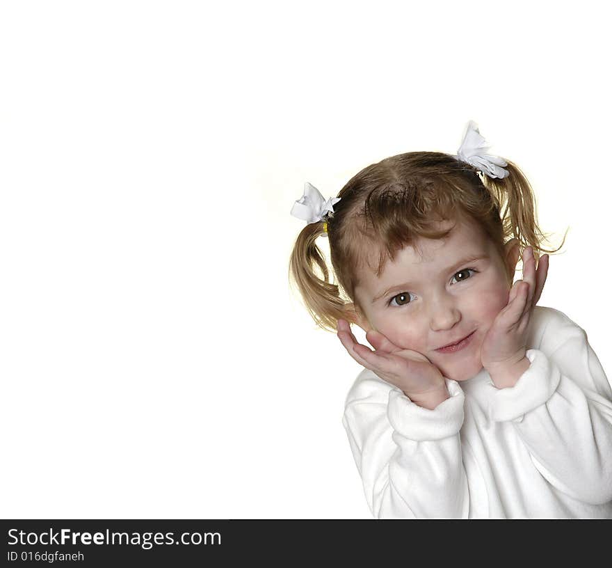 Little girl dressed in white making faces expressions. Little girl dressed in white making faces expressions