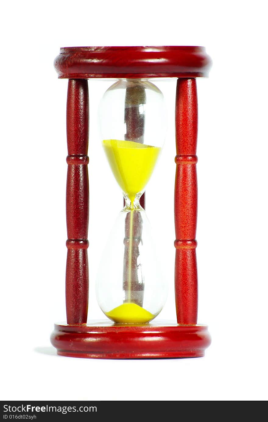 Sand clock with gold sand on white