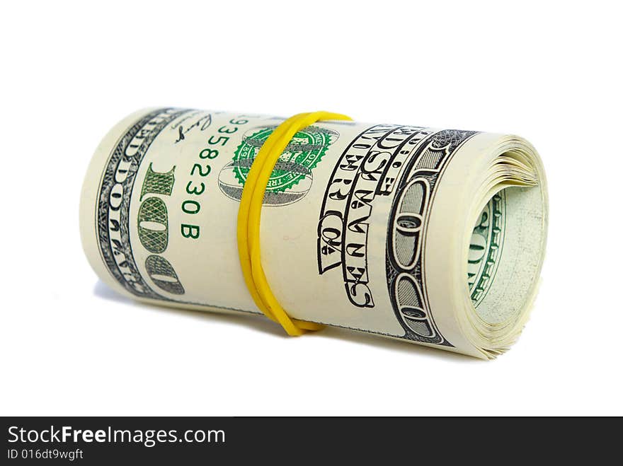 Roll of dollars close-up against white background. Roll of dollars close-up against white background.