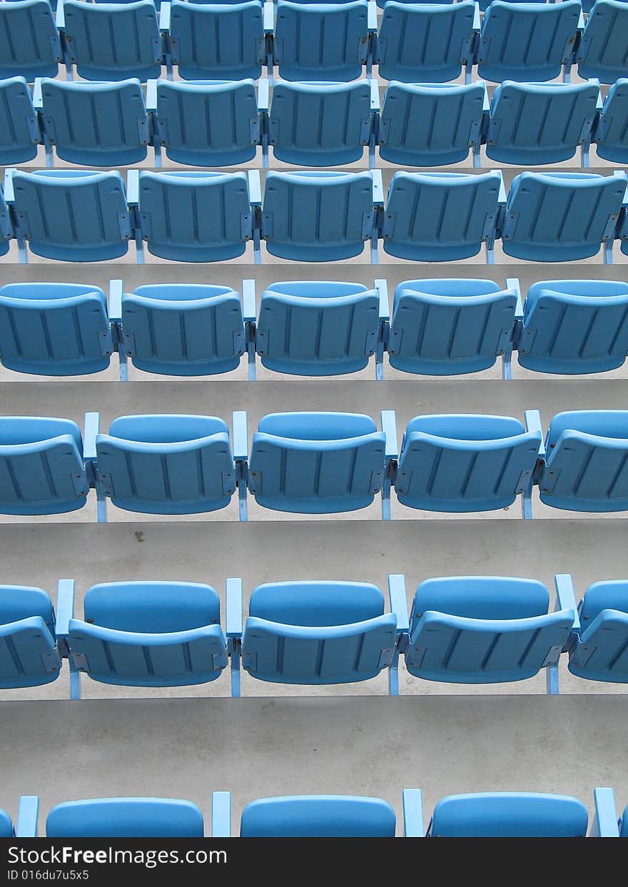 Blue Aligned Plastic Chairs