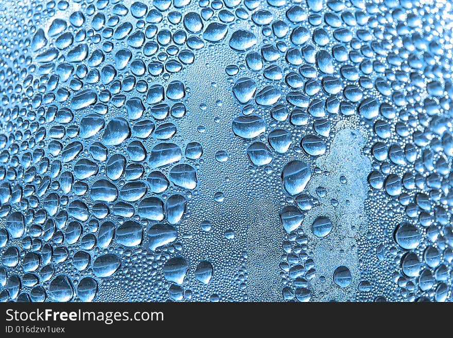 Water drops on a bottle