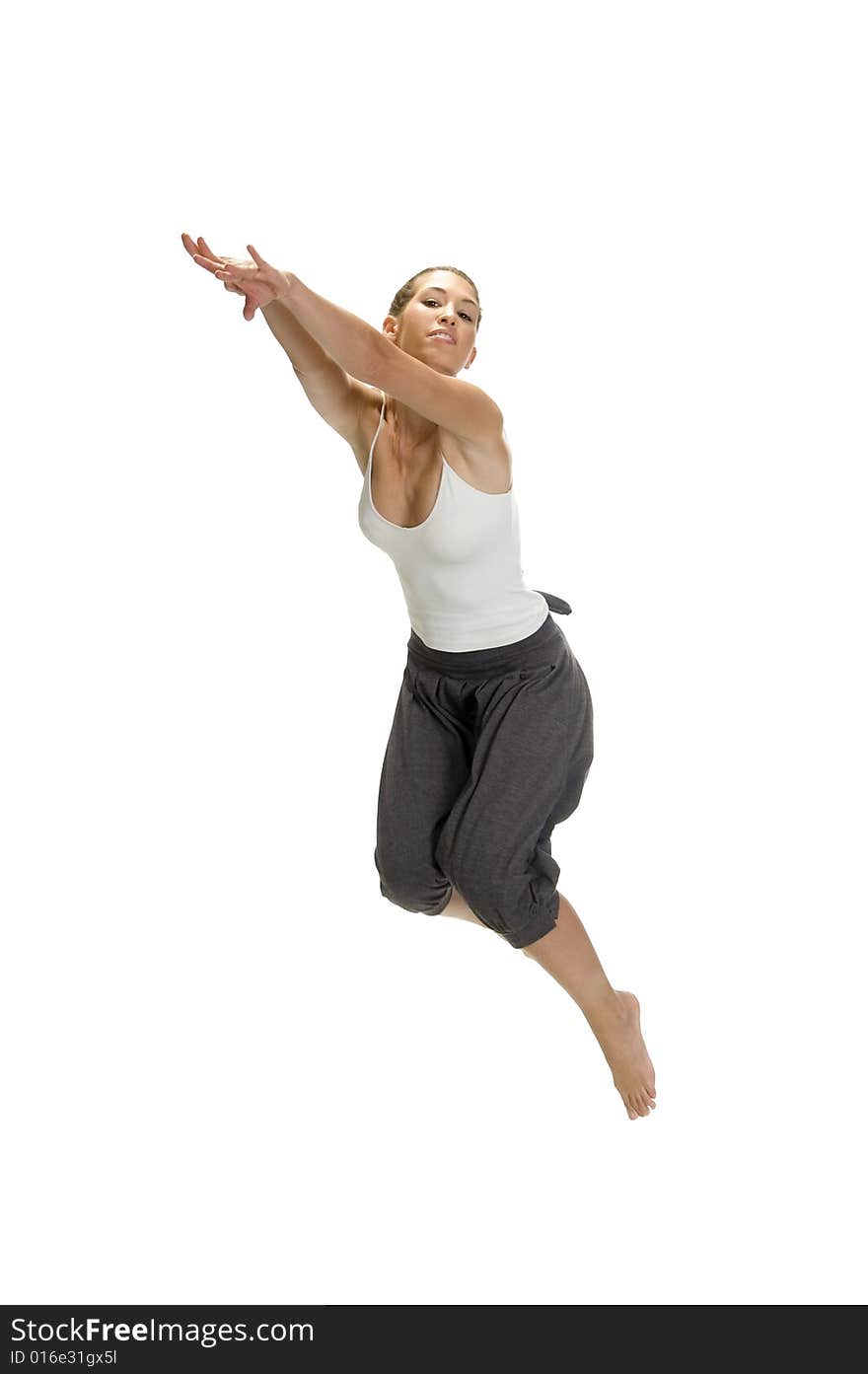 Caucasian woman leaps in air