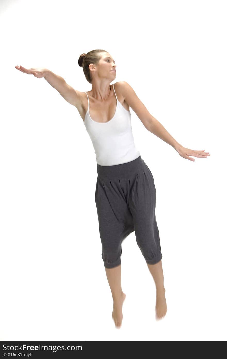 Jumping woman stretching her arms