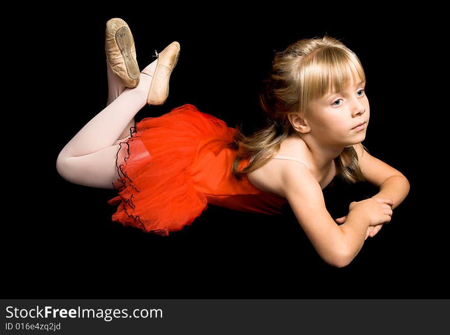 Young ballet dancer wearing a red costume. Young ballet dancer wearing a red costume