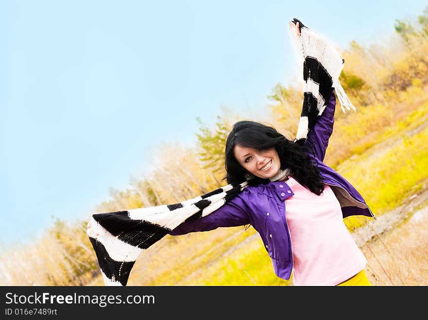 Happy smiling brunette girl outdoor. Happy smiling brunette girl outdoor