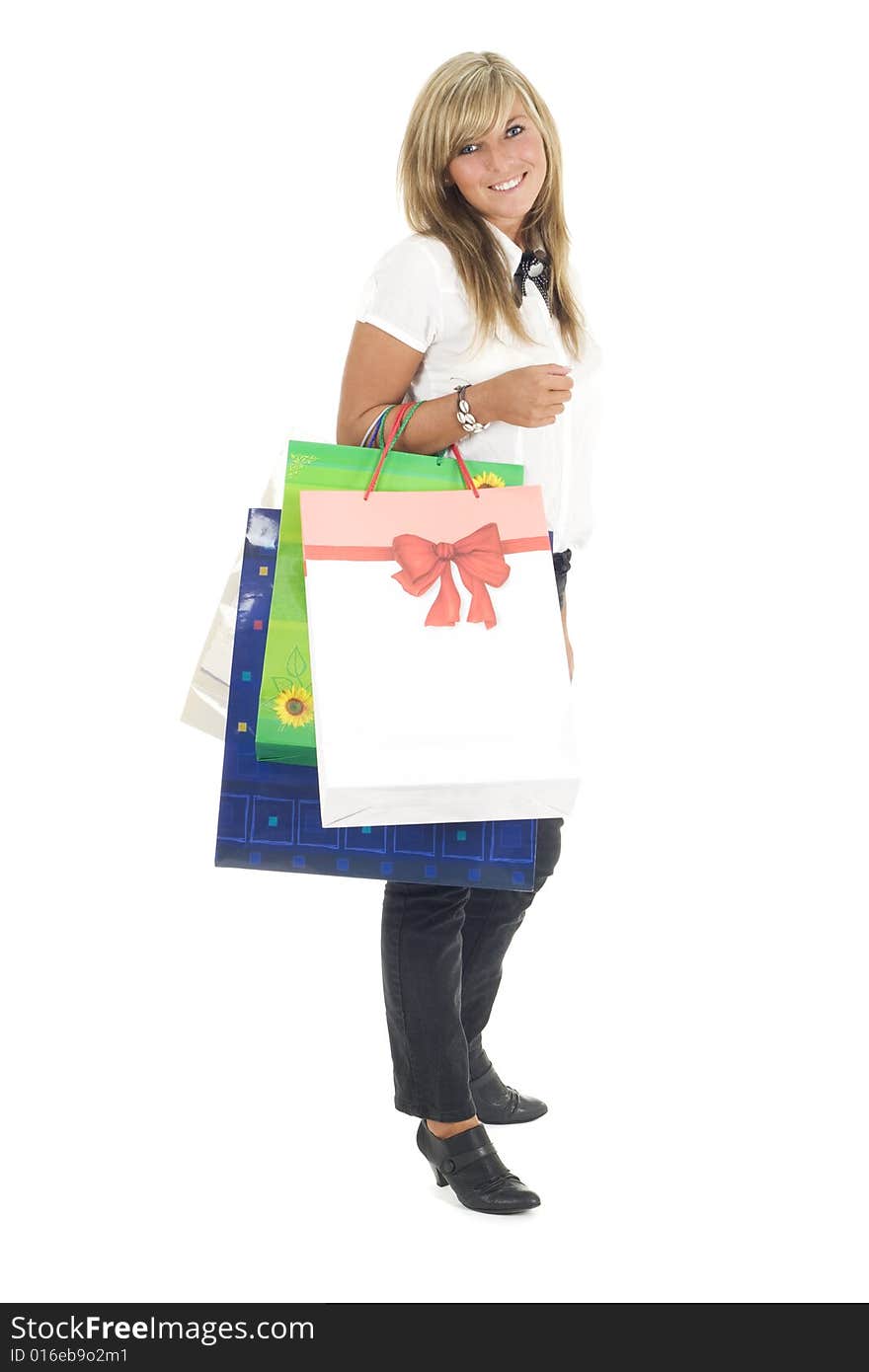 Pretty girl with bags isolaated on white