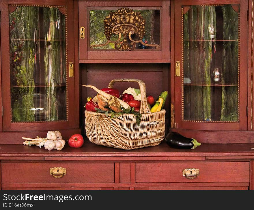 Vegetables On Old Cupboard.