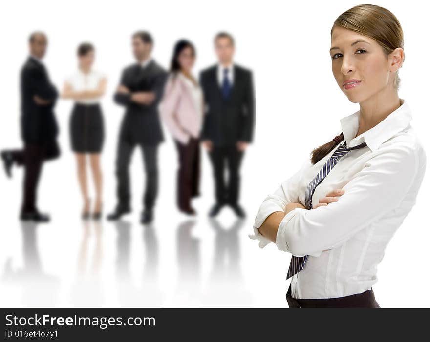 Businesswoman looking to camera near business group on an isolated white background. Businesswoman looking to camera near business group on an isolated white background