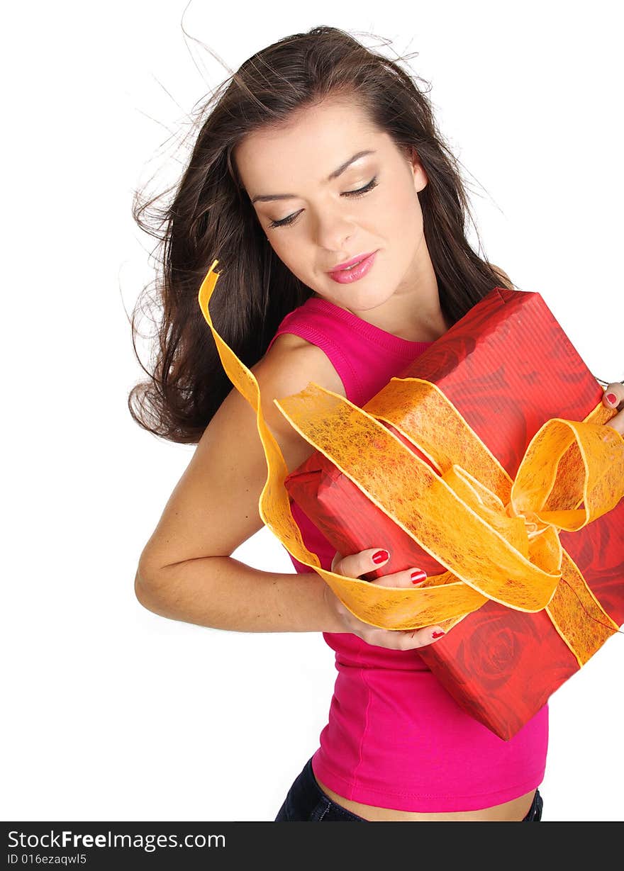 Girl smiles and holding a gift box