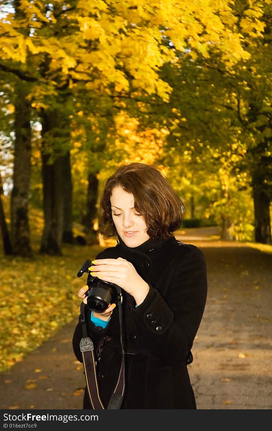 Young woman in autumn park. Young woman in autumn park