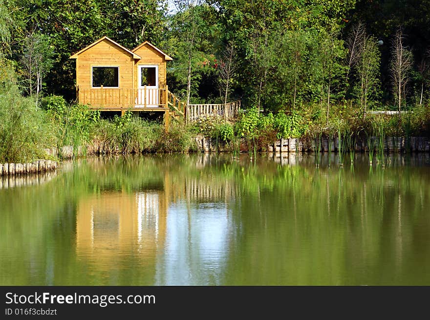 Frame houses in summer forest. Frame houses in summer forest