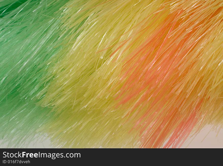 Rainbow background of artificial fibres