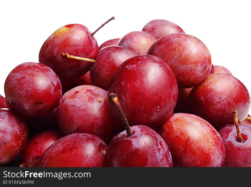 Plums on a white background