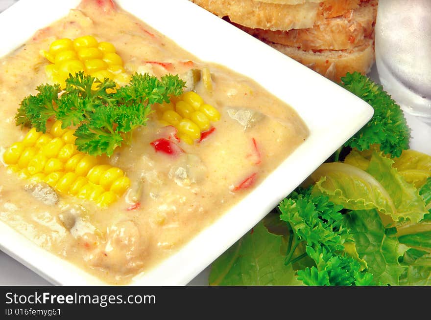 Home-made chicken corn chowder with bread and salad.