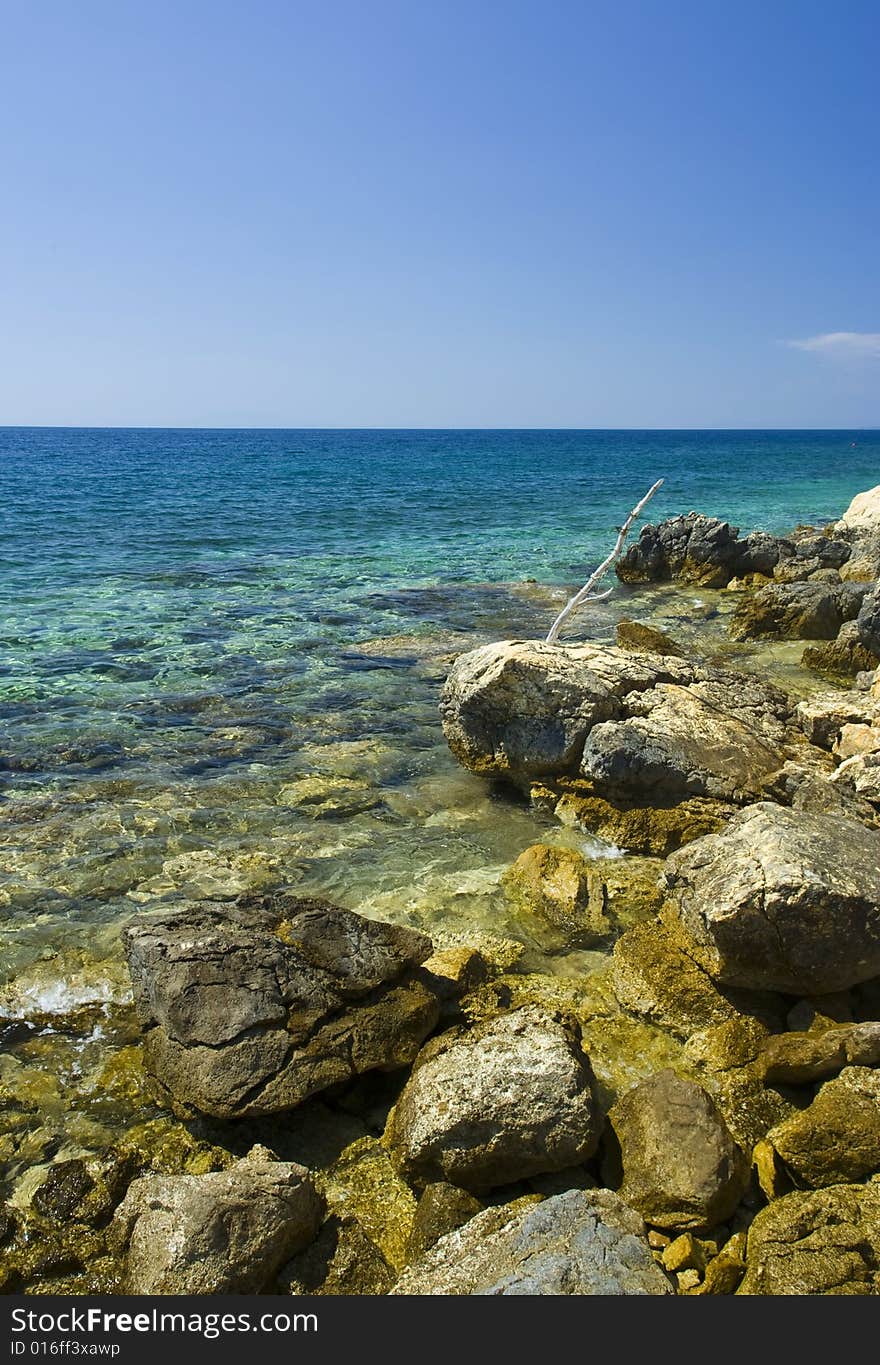 Adriatic sea beach with barb wire, island Pag, Croatia