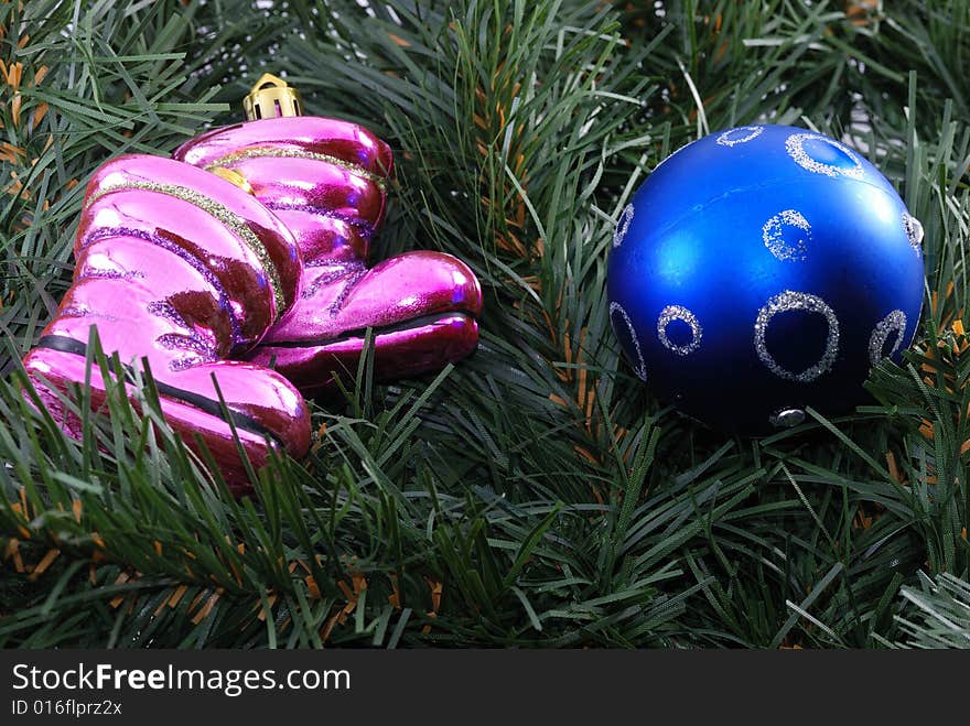 Christmas soccer - toy shoes and ball on a christmas tree