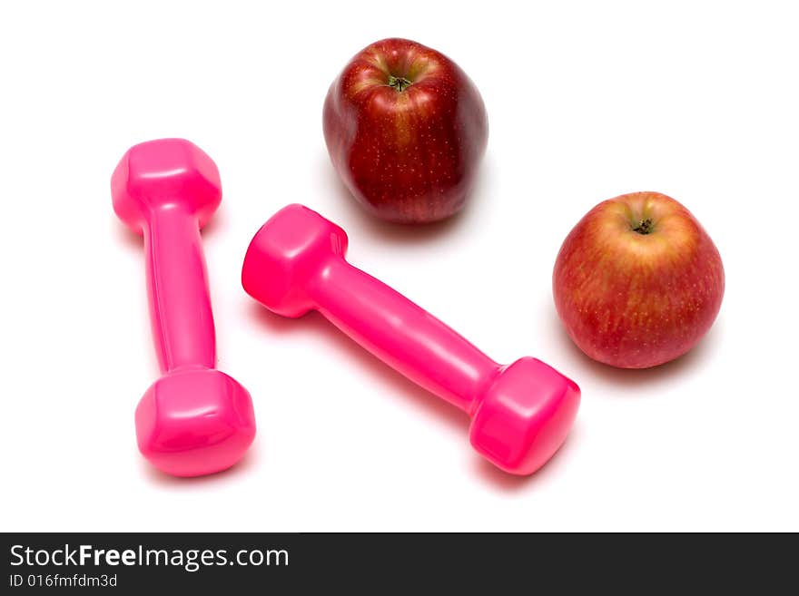 Dumbbells and apples on the white,fitness. Dumbbells and apples on the white,fitness