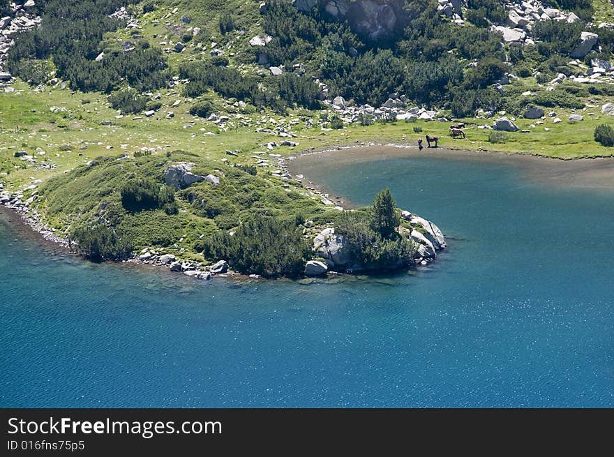 Lake in the prin mountains with clear blue water. Lake in the prin mountains with clear blue water