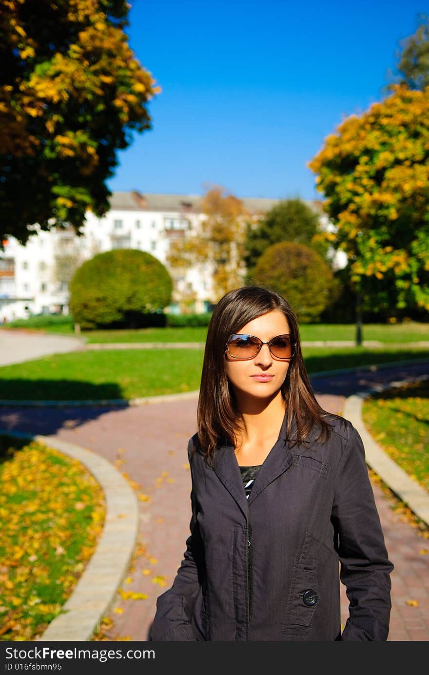 Pretty young girl on a colourful background