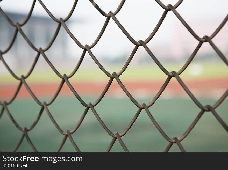 Chain link fence with a blue sky