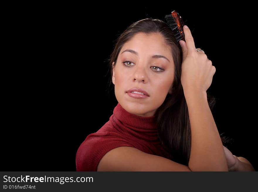 Woman brushing her hair