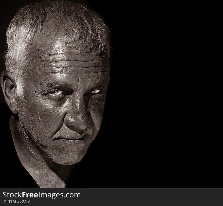 Striking Image of a man on Black background. Striking Image of a man on Black background