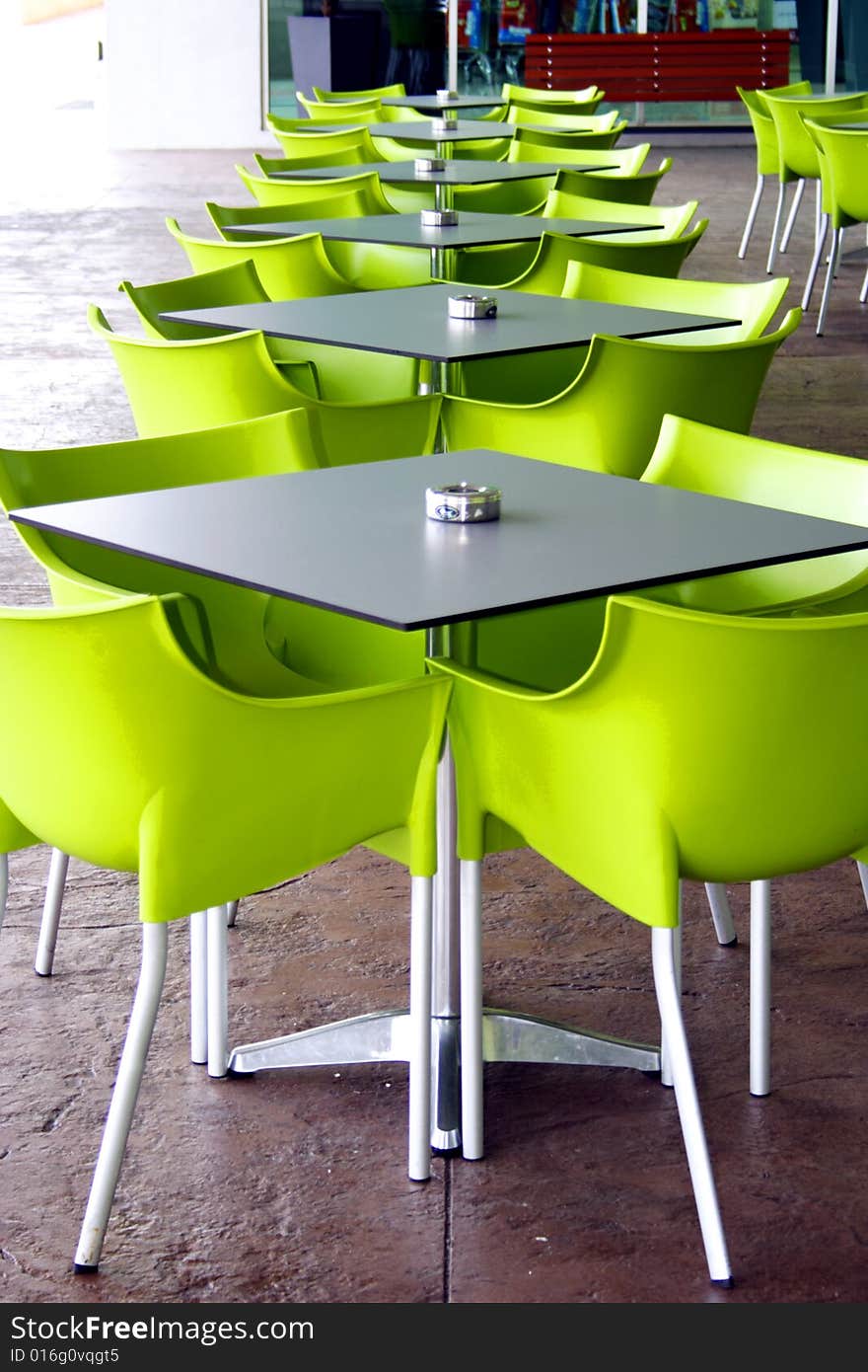 Images of Green chairs and tables at outdoor. Images of Green chairs and tables at outdoor