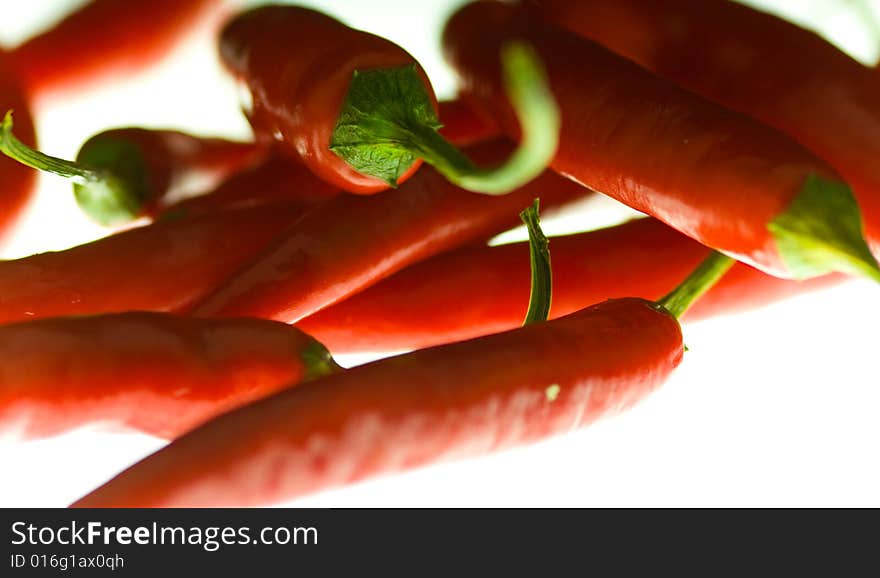 Close up of chillies on a lightening desk. Close up of chillies on a lightening desk