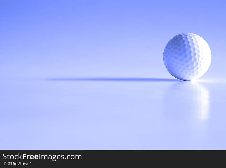 Closeup of golfball with dark shadows. Closeup of golfball with dark shadows