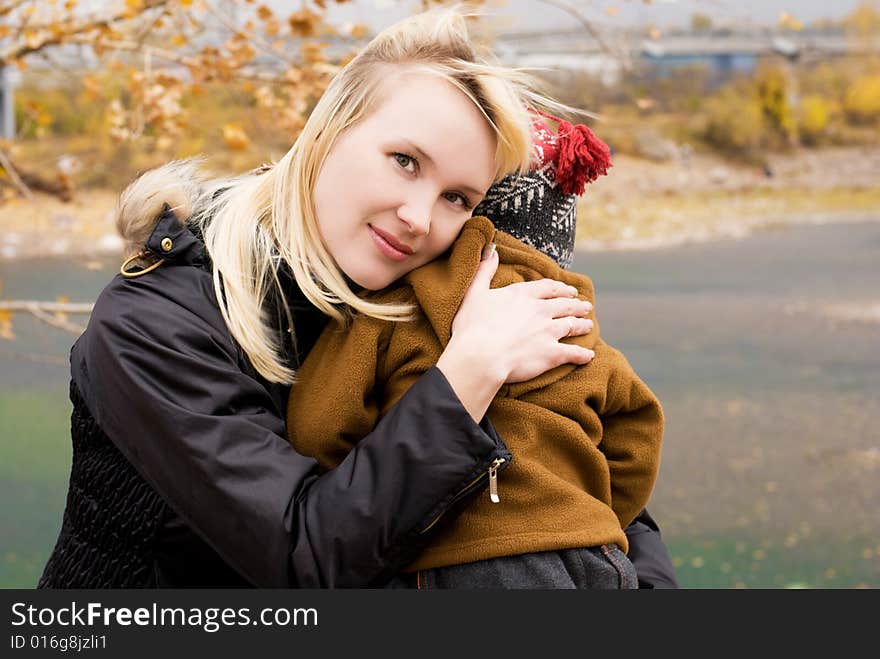 Beautiful mother with her little son outdoor. Beautiful mother with her little son outdoor