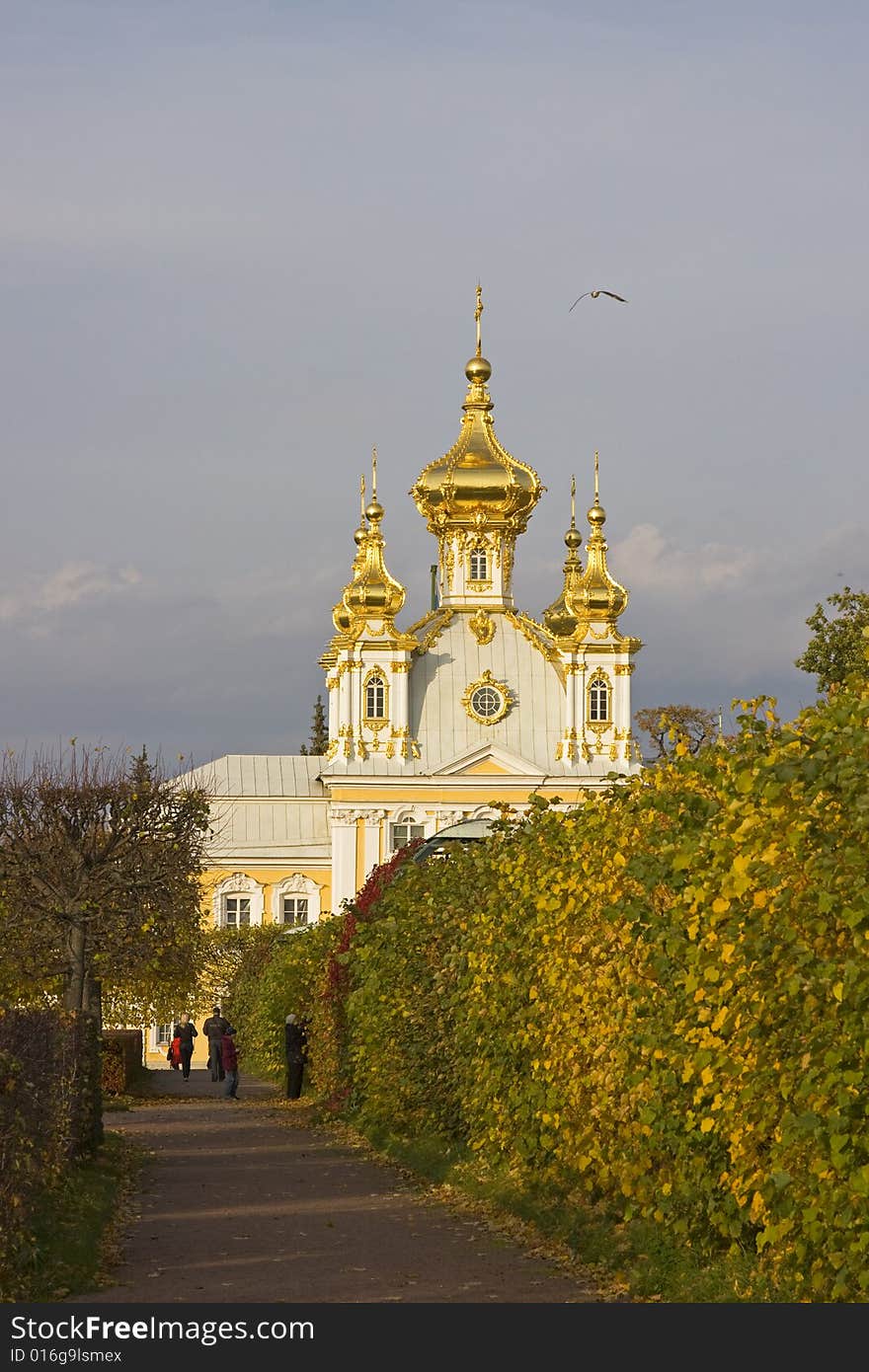 The Grand Palace from Upper Garden in autumn bright sunlight, Peterhof, St. Petersburg, Russia. The Grand Palace from Upper Garden in autumn bright sunlight, Peterhof, St. Petersburg, Russia