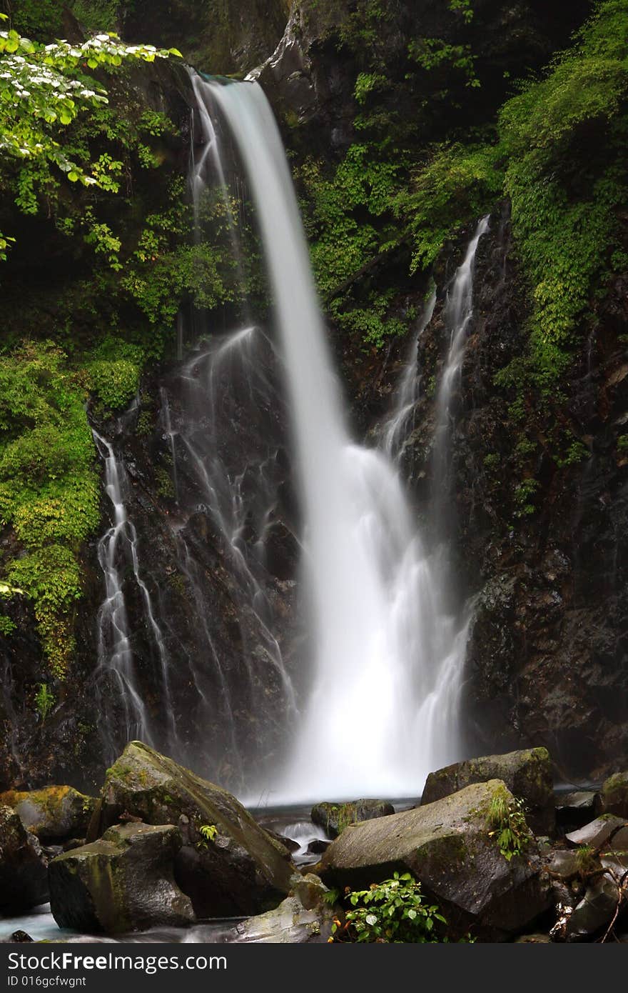 A photograph of a Nikko waterfall in Japan.