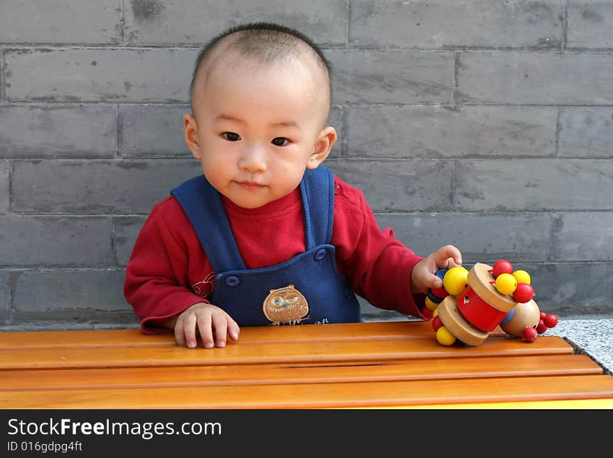 The young boy and his toy