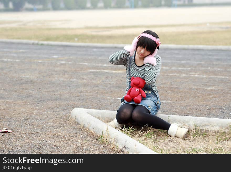 A beautiful female student on campus. A beautiful female student on campus.