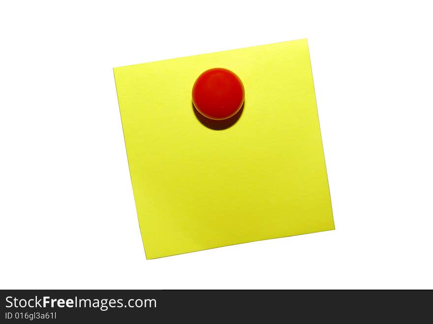 Yellow sticky notepaper with red magnet. Isolated on white with clipping path. Yellow sticky notepaper with red magnet. Isolated on white with clipping path.