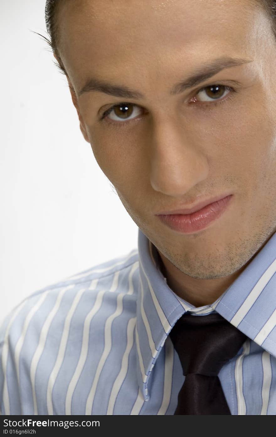 Close up young businessman posing