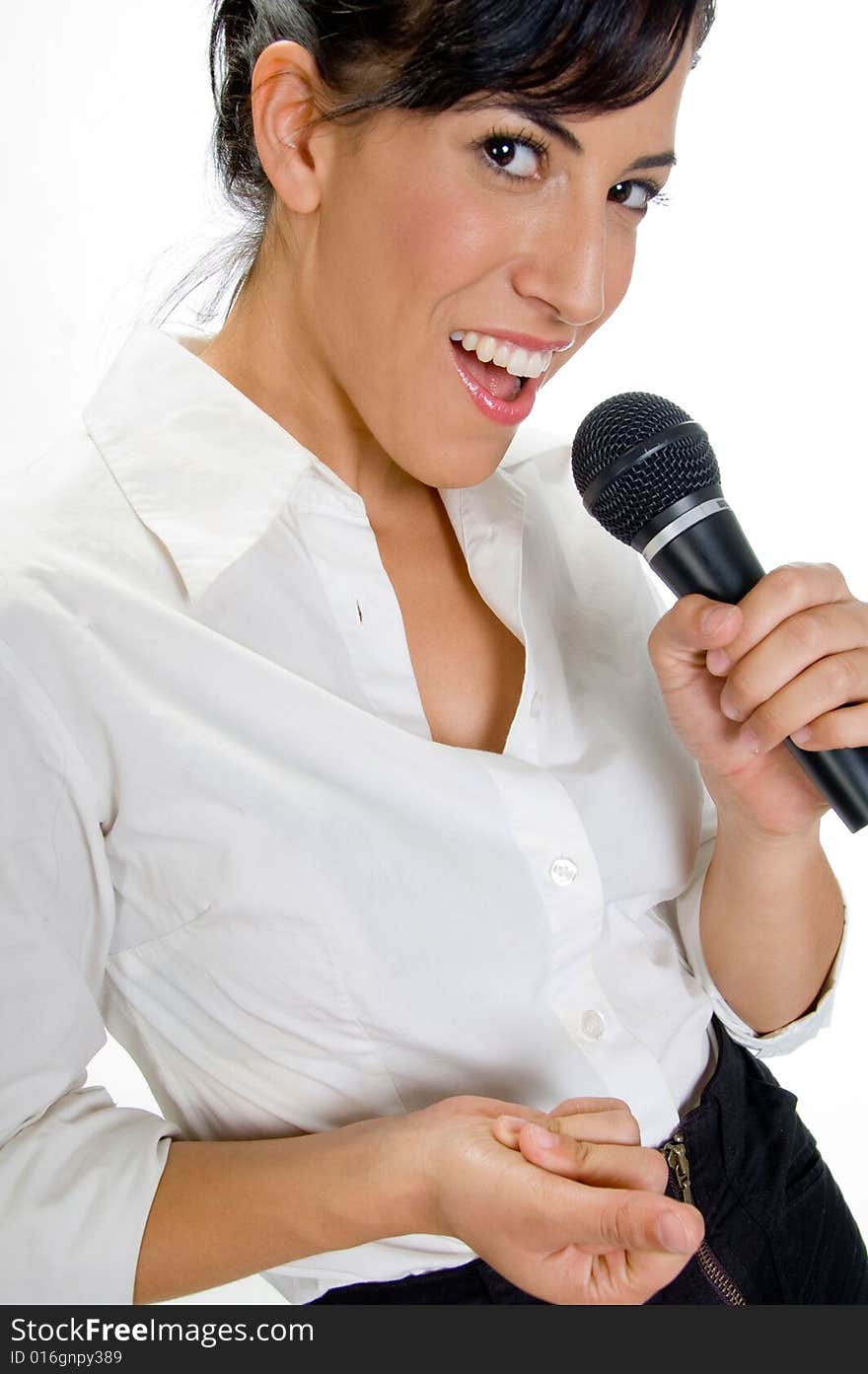 Portrait of female singer with microphone