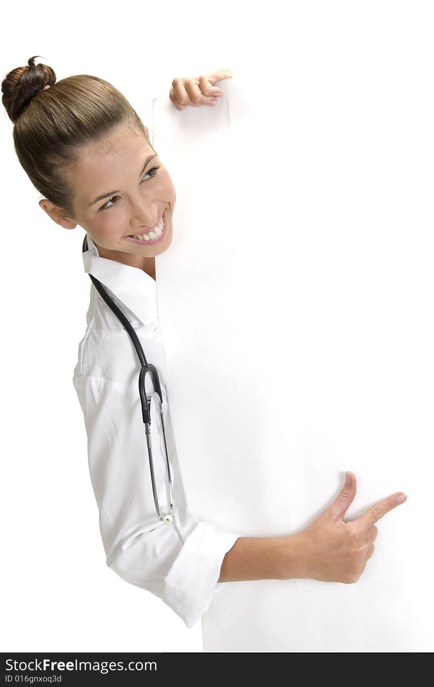 Smiling lady doctor indicating to the placard