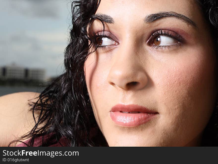 Headshot of a Young female glancing away