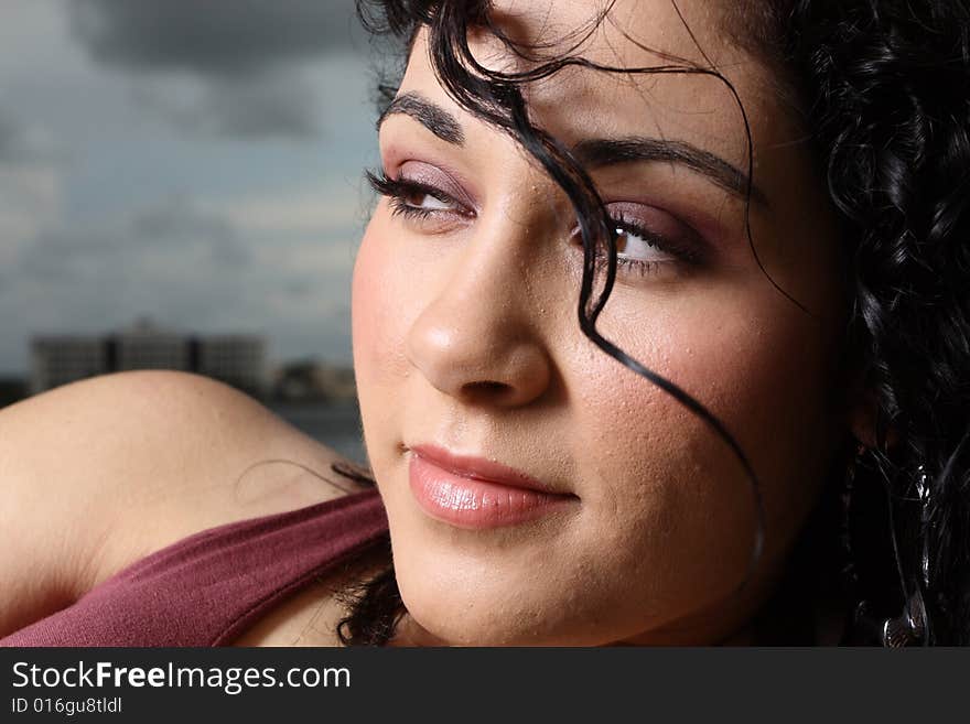 Headshot of a Young female glancing away