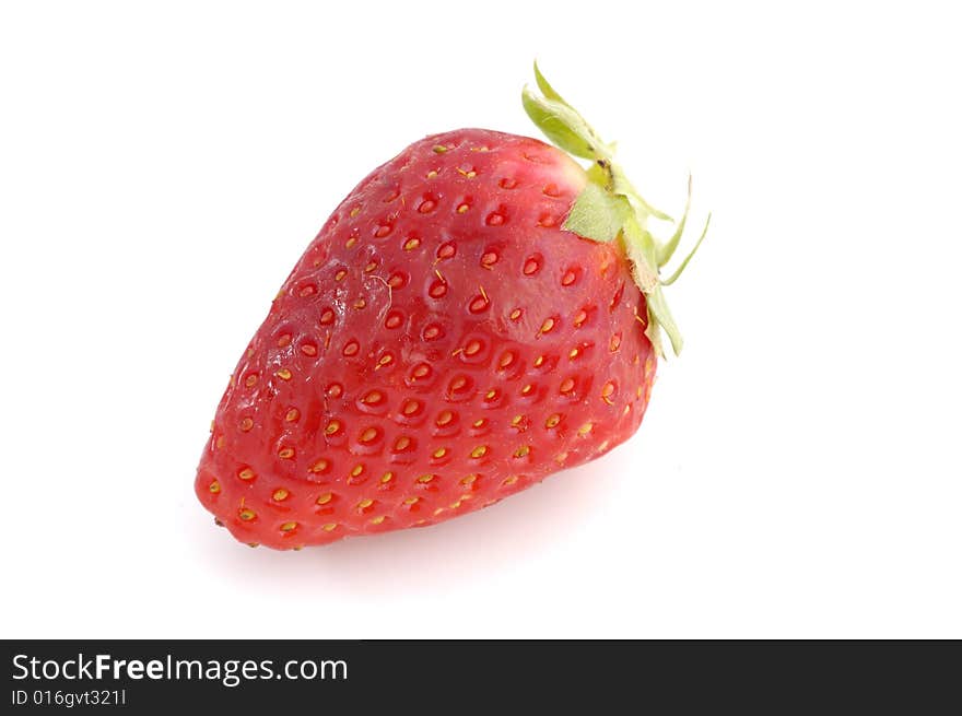 Appetizing brightly red strawberry on a white background